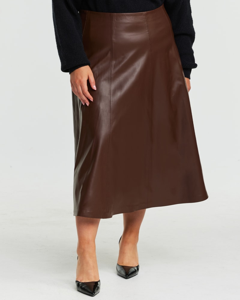 Front of a model wearing a size 16W Ashdown Pu Leather Skirt in Chocolate by Estelle. | dia_product_style_image_id:323707